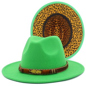 Detailed close-up of green wool fedora hat featuring leopard print lining and beaded band