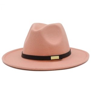 Detail of light pink wool felt fedora featuring a black leather band and gold buckle