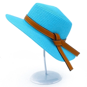 Sky blue straw sun hat detail with brown leather ribbon band and neat white stitching