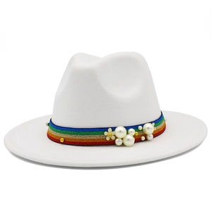 Elegant white fedora wool hat with iridescent pearl band and decorative cream flower