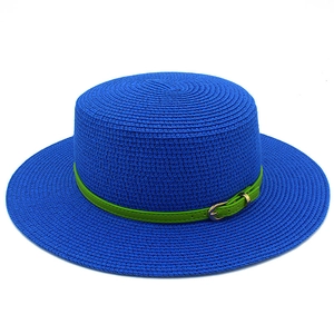 Blue boater straw hat with green leather belt and gold buckle for summer beach travel