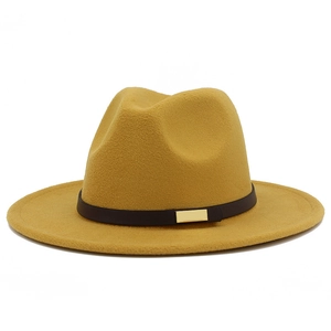 Detail of ginger yellow felt fedora hat featuring brown belt strap and gold buckle