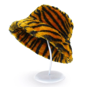 Plush tiger stripe bucket hat in vibrant orange and black for winter warmth