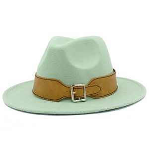 Detail of mint green wool felt fedora featuring a brown leather band and silver buckle