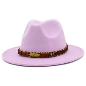 Detailed view of pink fedora hat with gold feather pendant and beaded decorative band