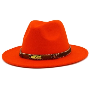 Classic orange wide brim wool fedora hat with ethnic beaded band and gold feather charm