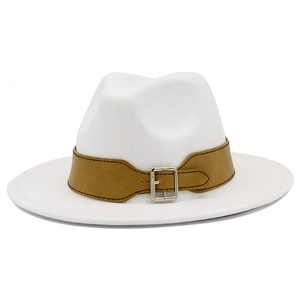 Detailed view of white fedora hat with camel leather band and metallic buckle