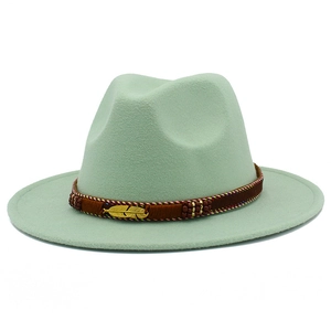 Detail of mint green wool fedora hat with brown band and golden feather metal buckle