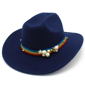 Detailed view of dark blue wool fedora featuring colorful woven band with white pearls
