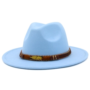 Detail of light blue felt fedora with braided band and golden feather ornament