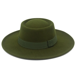 Detailed macro view of olive green wide brim wool felt boater hat with grosgrain ribbon