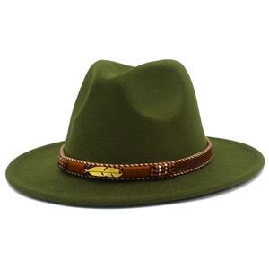 Detailed close-up of dark green wool fedora with a decorative feather and beaded band