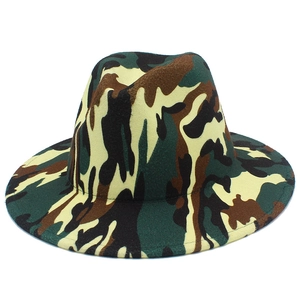 Detail showing the camouflage pattern texture on a flat brim fedora wool hat
