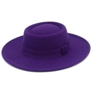 Side view of a dark purple wool fedora with a matching grosgrain ribbon detail