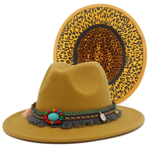 Detail of leopard print lining and ethnic turquoise decoration on wool fedora hat