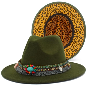 Detail of olive green wool fedora featuring ethnic beaded band and turquoise stone accent