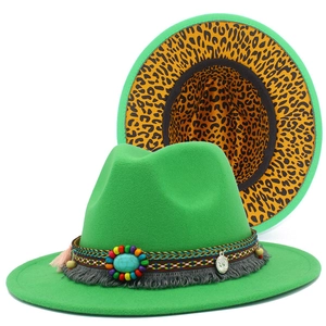 Detail of green fedora featuring ethnic style beads, turquoise stone and leopard print brim