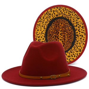 Red wool fedora hat with leopard print brim underside and belted leather buckle