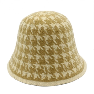 Close-up showing the premium houndstooth knit texture and thick edge of the bucket hat