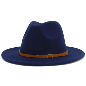 Detail of the navy blue felt fedora hat featuring a brown leather strap and gold metal buckle