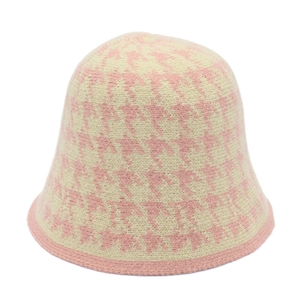 Chic pink and white houndstooth knit bucket hat with a stylish round top for women