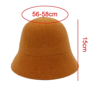 Detailed measurement view of knitted bucket hat showing 56-58cm circumference and 15cm height