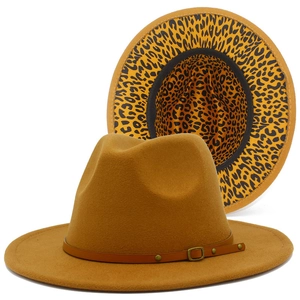Detailed view of stackable wool fedora hat with leopard print lining and leather belt buckle