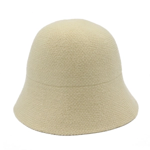 Minimalist beige wool knit bucket hat with warm textured weave for women's winter fashion