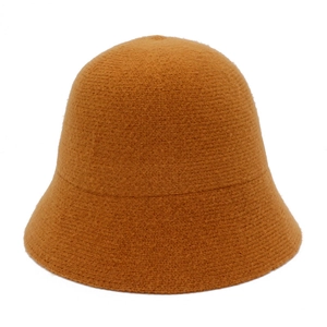 Detail view of caramel knitted wool bucket hat with thick and warm textured finish