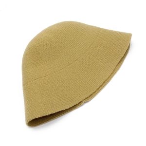 Close-up of ginger yellow wool knit bucket hat showing soft fabric texture and rolled edge