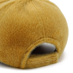 Close-up of the back adjustable strap and soft faux mink fur texture on the baseball cap