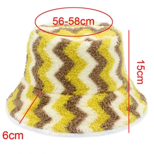 Detail view showing dimensions of reversible fuzzy bucket hat with yellow striped pattern