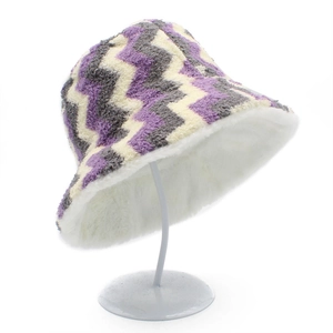 Detail of striped plush bucket hat showing thick white faux fur lining and wavy pattern