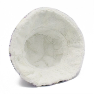 Detailed close-up of thick white plush faux fur lining inside the striped bucket hat