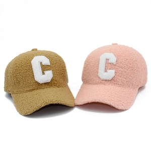Sherpa fleece baseball caps in camel and pink colors with C letter embroidery