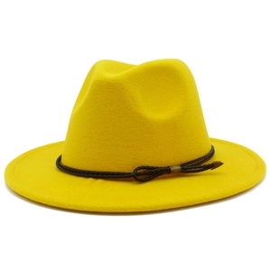 Detail view of yellow wool fedora hat with brown braided leather band and bronze arrow buckle