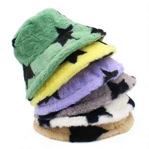 Detailed stack of faux rabbit fur bucket hats with star prints in multiple vibrant colors