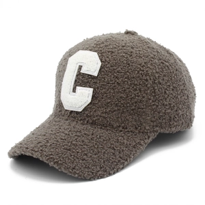 Detail of grey fleece baseball cap featuring white towel embroidered C letter patch