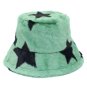Close-up of mint green faux rabbit fur bucket hat with black star print details