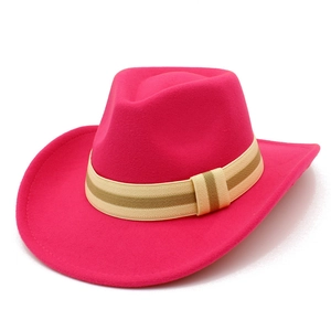 Detail of rose red wool felt cowboy hat with striped ribbon band and pinched crown