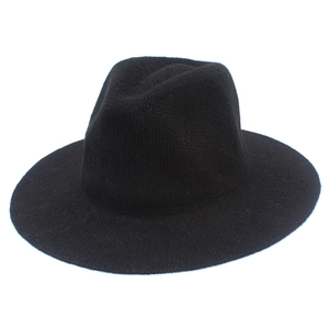 Close-up of black knitted chenille fedora hat with a wide brim and soft warm texture