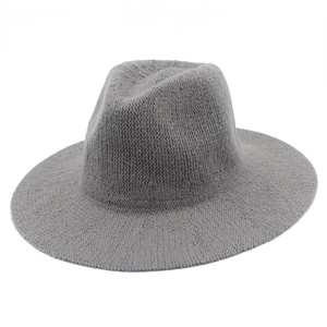 Macro detail of the grey knitted fedora hat showing premium chenille fabric texture