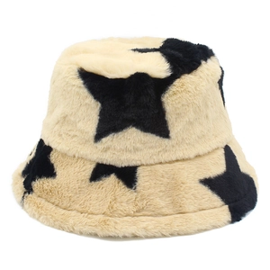 Detail of plush faux rabbit fur texture with star pattern on the winter bucket hat