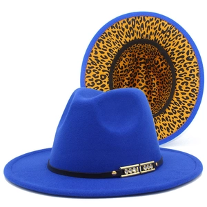 Detail of blue wool fedora featuring leopard print lining and golden rhinestone buckle