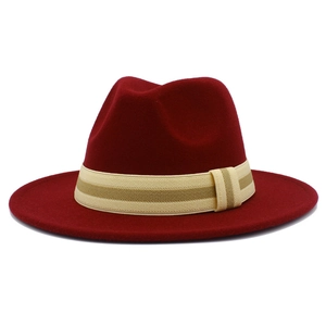 Detailed close-up of wine red wool fedora hat featuring a striped woven band decoration