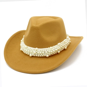 Close-up of camel western cowboy hat featuring elegant white pearl bead trim decoration