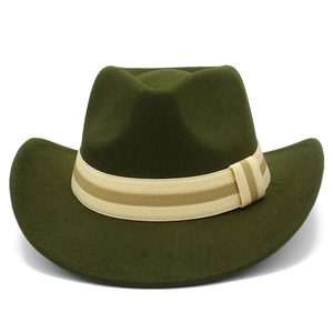 Detail view of the deep green wool felt fedora hat with a striped beige band decoration