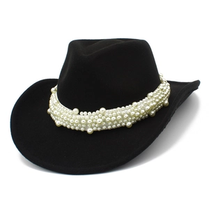 Detail of western cowboy hat featuring luxury faux pearl decorative band on black felt