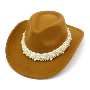 Close-up of camel western cowboy hat featuring elegant white pearl beaded decoration band