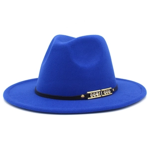 Close-up of royal blue wool fedora hat with black band and gold rhinestone buckle
